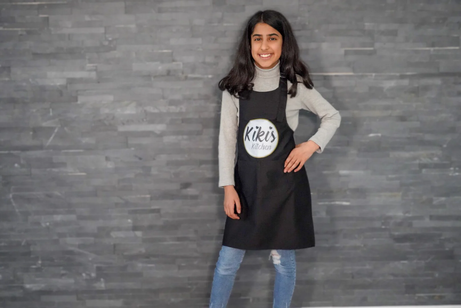 Kikis Kinderschürze Schwarz